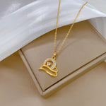 Cargar imagen en el visor de la galería, Collar Corazón Mud con Circones Blancos. Acero Titanio Inoxidable Chapado oro 18 K