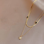 Cargar imagen en el visor de la galería, Collar Star Blanco y Negro. Acero Titanio Chapado Oro 18 K