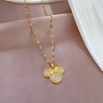 Cargar imagen en el visor de la galería, Collar Minnie dorado con Circón. Acero Titanio Chapado oro 18 K
