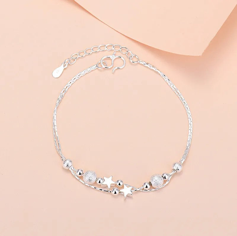 Pulsera Planeta y Estrella Ajuste de Gancho. Plata 925