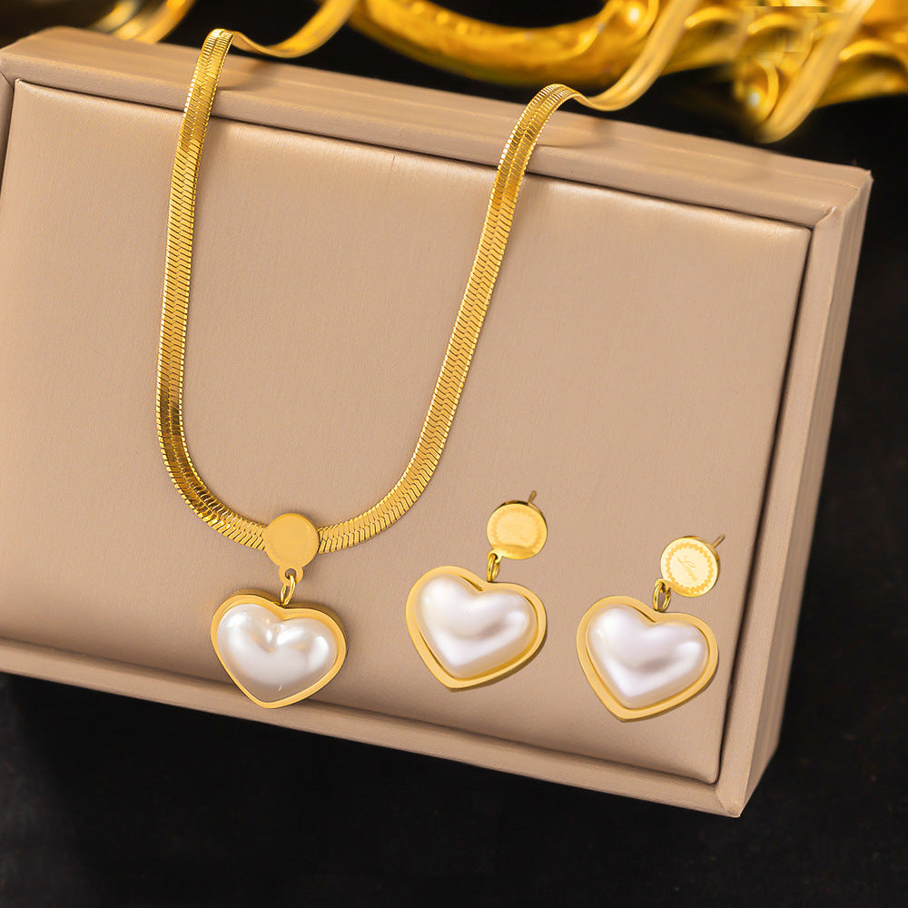 Set Corazón con Piedra Blanca. Acero Titanio Chapado Oro 18 K