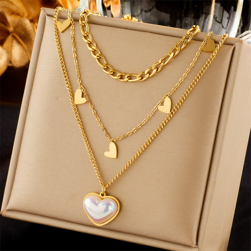 Collar Trio Corazón Blanco Acero Titanio Chapado oro 18K